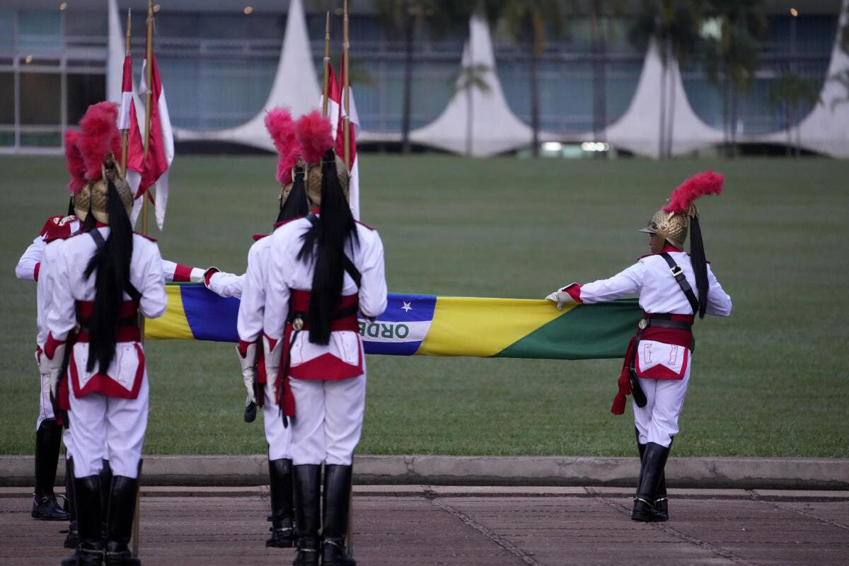 Brazil's President Lula back at official residence to recover from